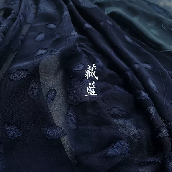 One piece of navy blue is half a meter wide - width is 1.5 meters. Multiple shots without cutting.