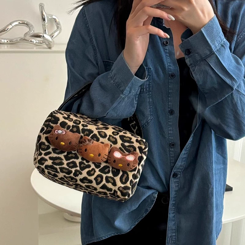 Handheld cosmetic bag, leopard print leather, capacious organizer (small & large cat-head options)