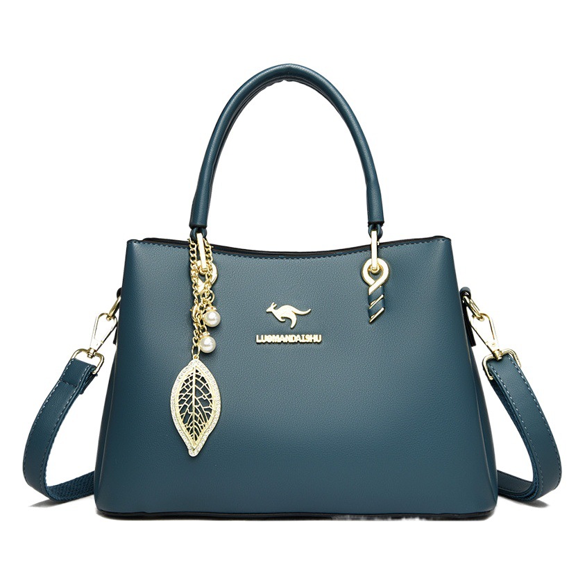 2023 nuevo práctico de gran capacidad simple viajero bolsa de mensajero de las mujeres bolsa de tres capas boca brillante cuero suave entrega de una pieza