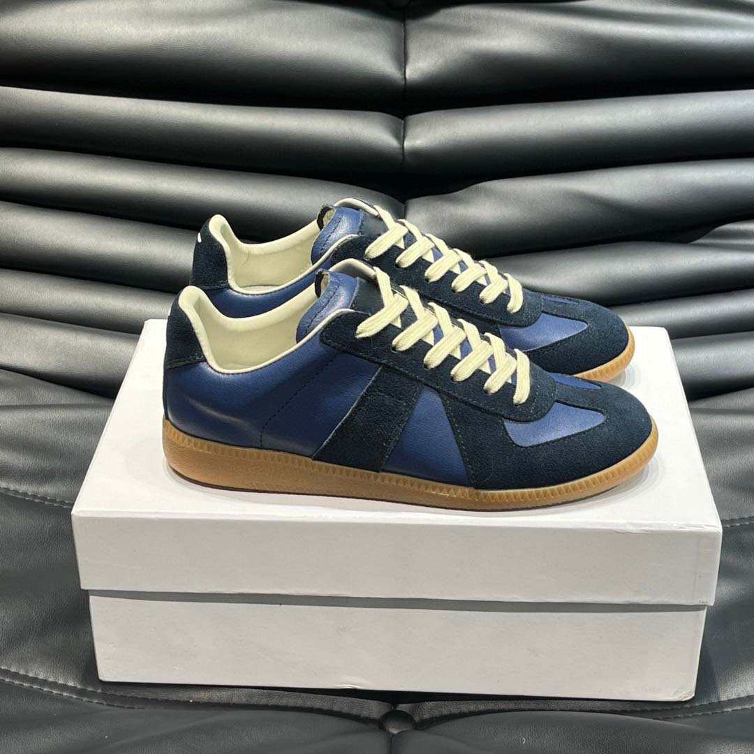 Estación europea 2025 nuevos zapatos de entrenamiento alemanes para hombres y mujeres zapatos planos casuales de todo fósforo zapatos de pareja con cordones de cuero zapatillas de deporte