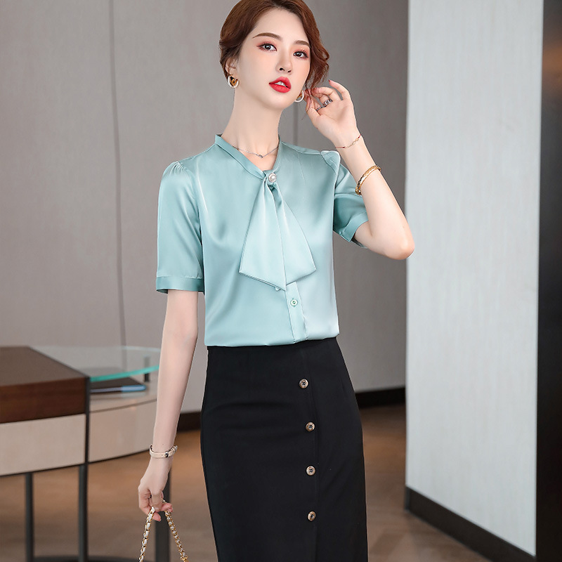Green summer fashionable elegant professional shirt with bow