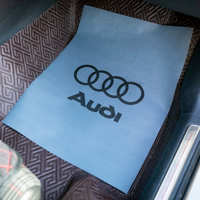 Universal Foot Pad: Y Car Disposable Non-woven Foot Mat - 4253-enlarged-gray-audi-logo-50-sheets