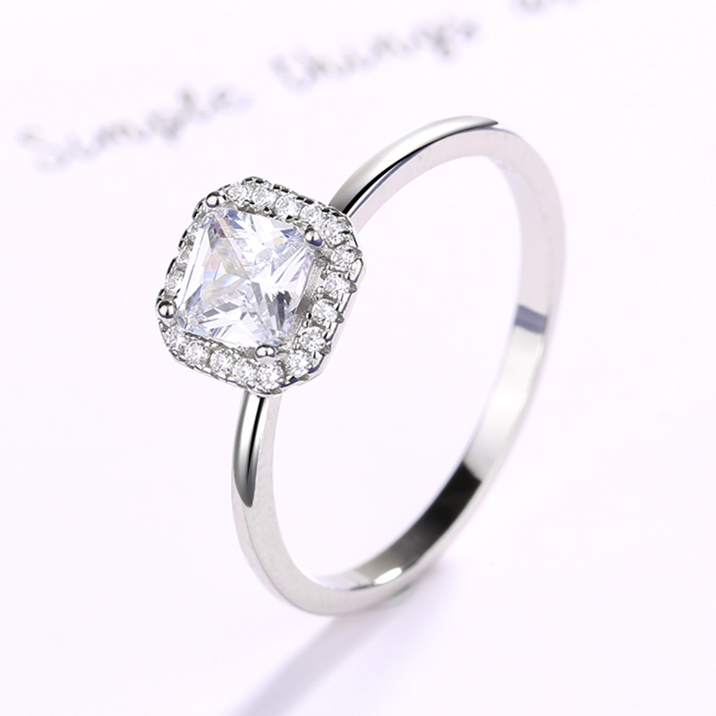 2025 Decorated Qi New Product White Copper Plated Platinum Four-Prong Square Ring for Women Korean Style Casual Classic Proposal Engagement