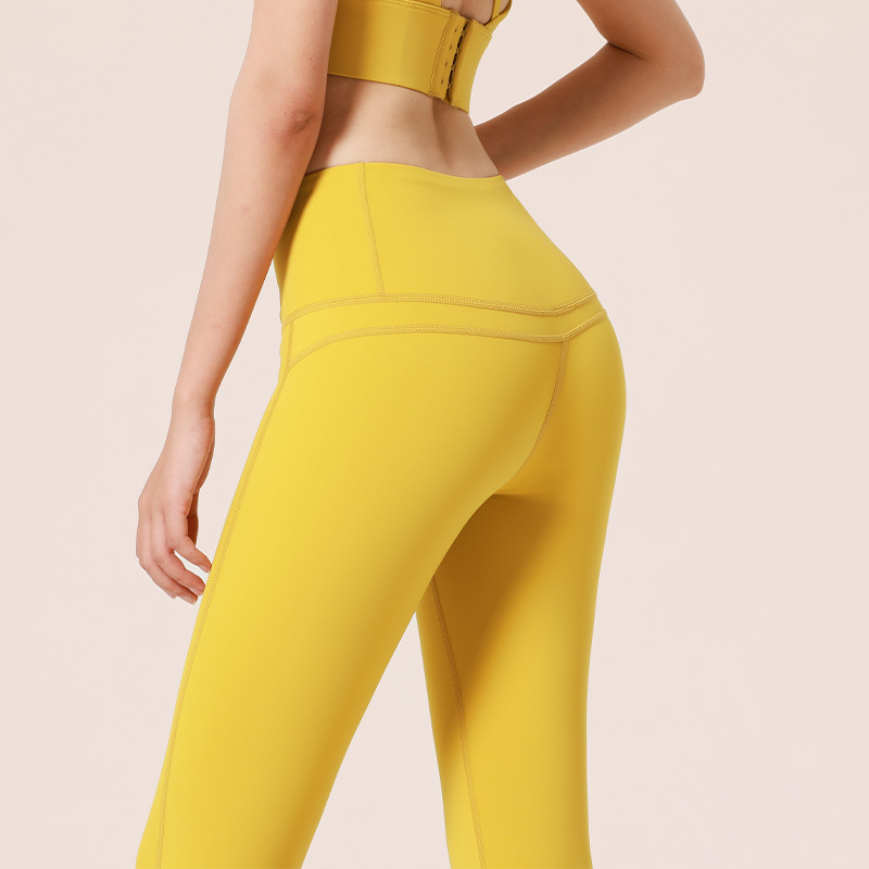 Juyitang europeo y americano desnudo melocotón verano fitness Pantalones mujer apretado cintura alta cadera elevación estiramiento correr deportes yoga Pantalones