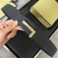 Silver base with brushed gold plate buckle, black lychee grain strap, 3.8cm wide