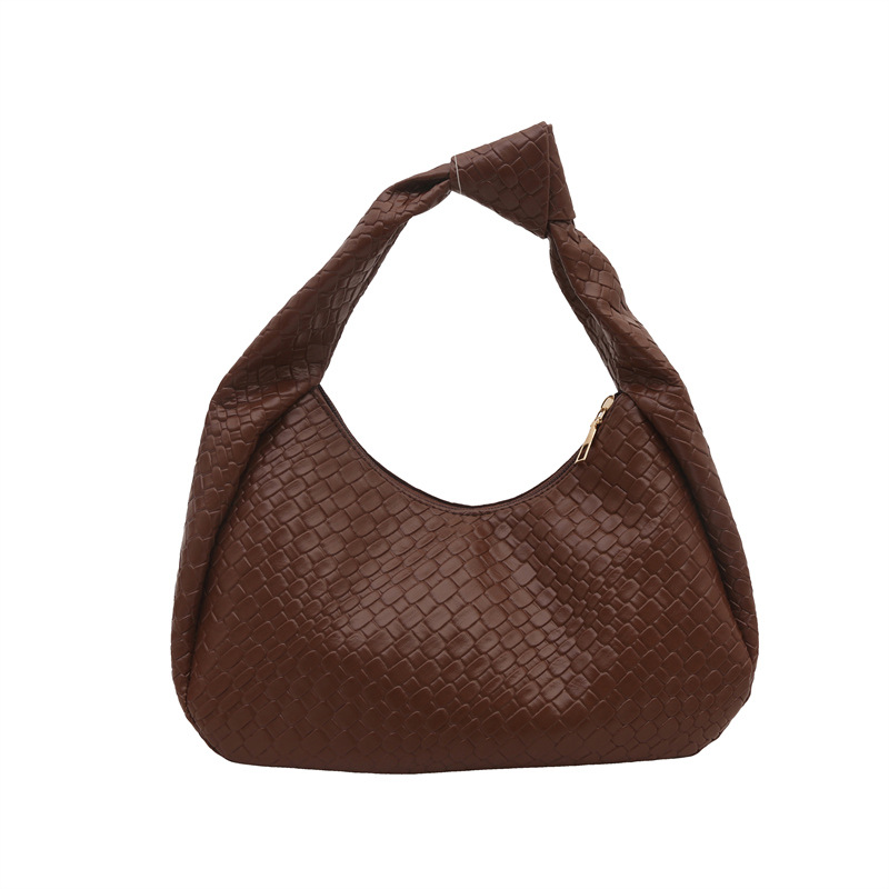 Casual retro de gran capacidad bolso de hombro de color sólido 2025 nuevo estilo de moda extranjera literatura y arte tejido brazaleta