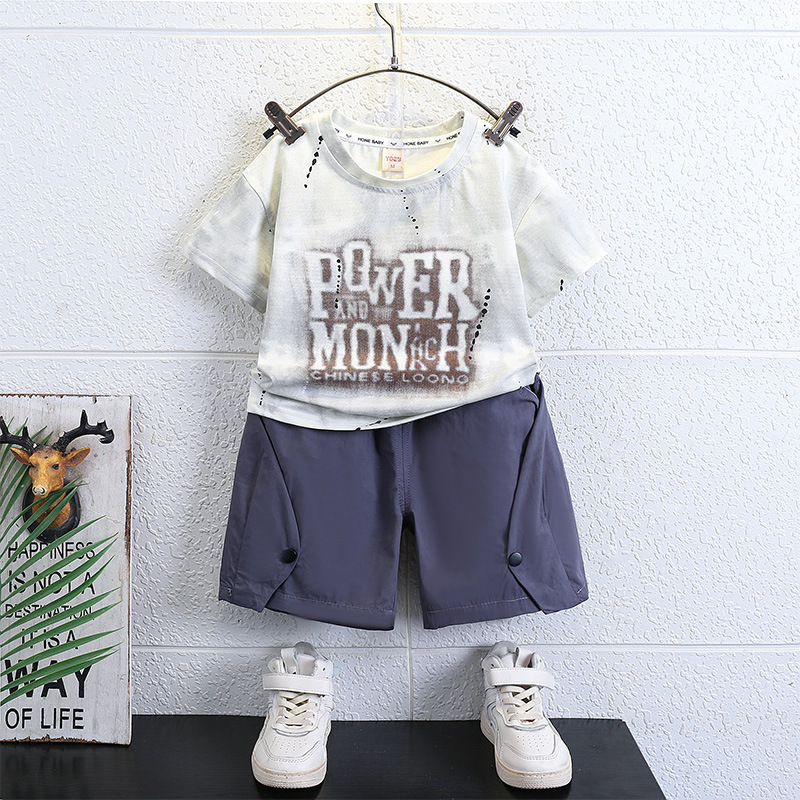7149 Traje de verano para niños Camiseta de manga corta estampada para niños Estilo de verano para bebés Marca de moda Traje de dos piezas 2025 Nueva tendencia