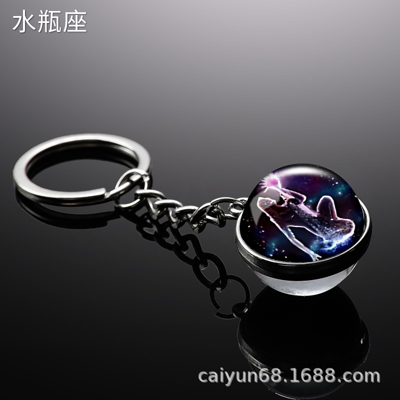 Transfronterizo 12 constelaciones de luz nocturna bolsos colgantes de bolsas de joyas de tiempo doble cara bola de vidrio llavero al por mayor