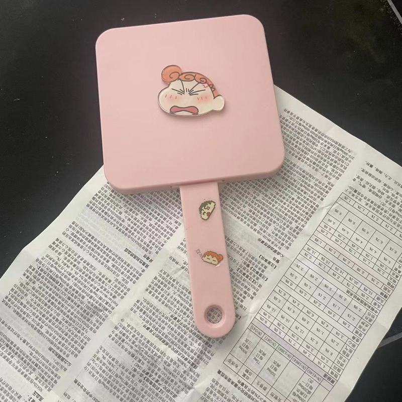 新商品のクレヨンの小さい新しいハンドルの鏡は櫛を持って携帯して化粧の鏡の少女の心の鏡を持って一体の小さい鏡の女性を櫛にします。|undefined