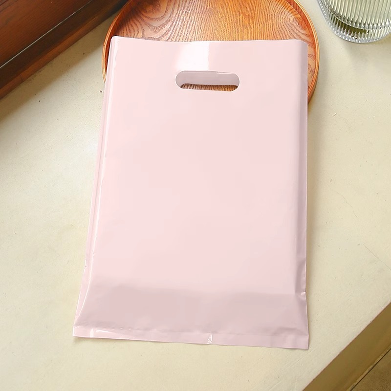 Bolsa de mano de tienda de ropa de grosor, bolsa de embalaje de ropa para niños y niñas, bolsa de almacenamiento de cosméticos, bolsa de regalo, bolsa de embalaje comercial