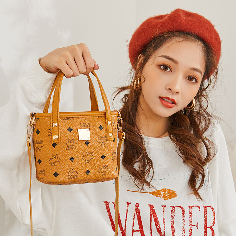 Guangzhou Bag2023 nuevo bolso de balde bolso de moda impreso bolso de mano de mujer retro bolso de hombro ocio
