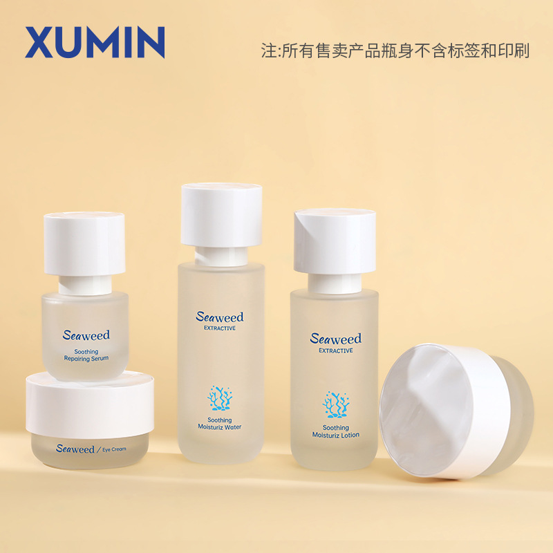 Botella de traje de vidrio cosmético de nuevo producto 30 ml / 100 ml botella de presión de emulsión exfoliante 30 - 50g material de embalaje de botella de crema