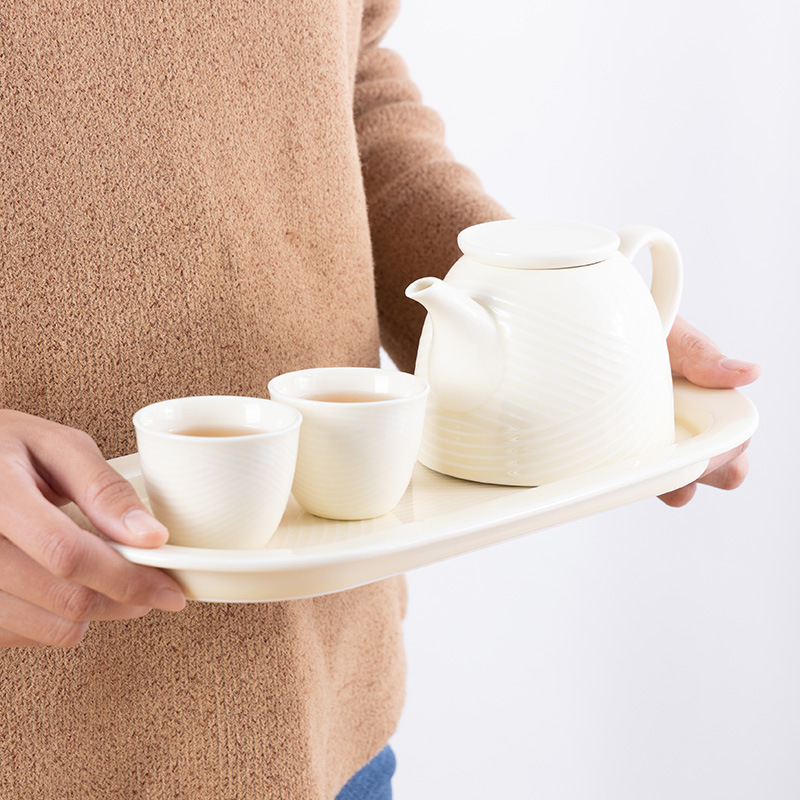 Porcelana personalizada de pelo suelto, crema de viento Qingluo Kung Fu, juegos de té para el hogar, regalos de alta calidad, juegos de té chinos.