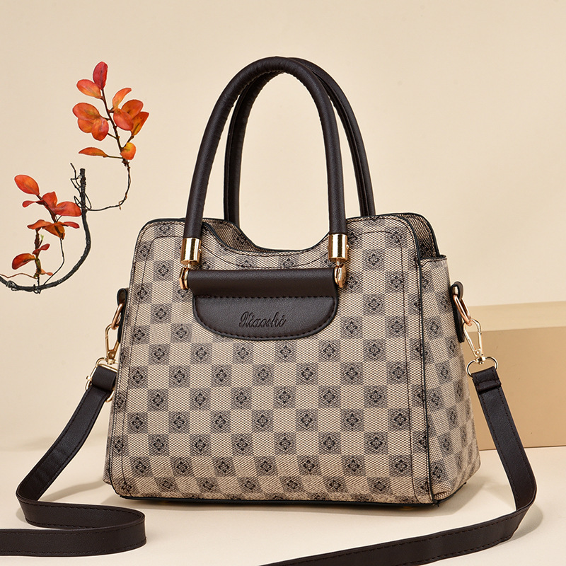 2024 fabricantes bolsos de mano de gran capacidad bolsos de mujer retro versátil bolsos de hombro texturas bolsos de tendencia
