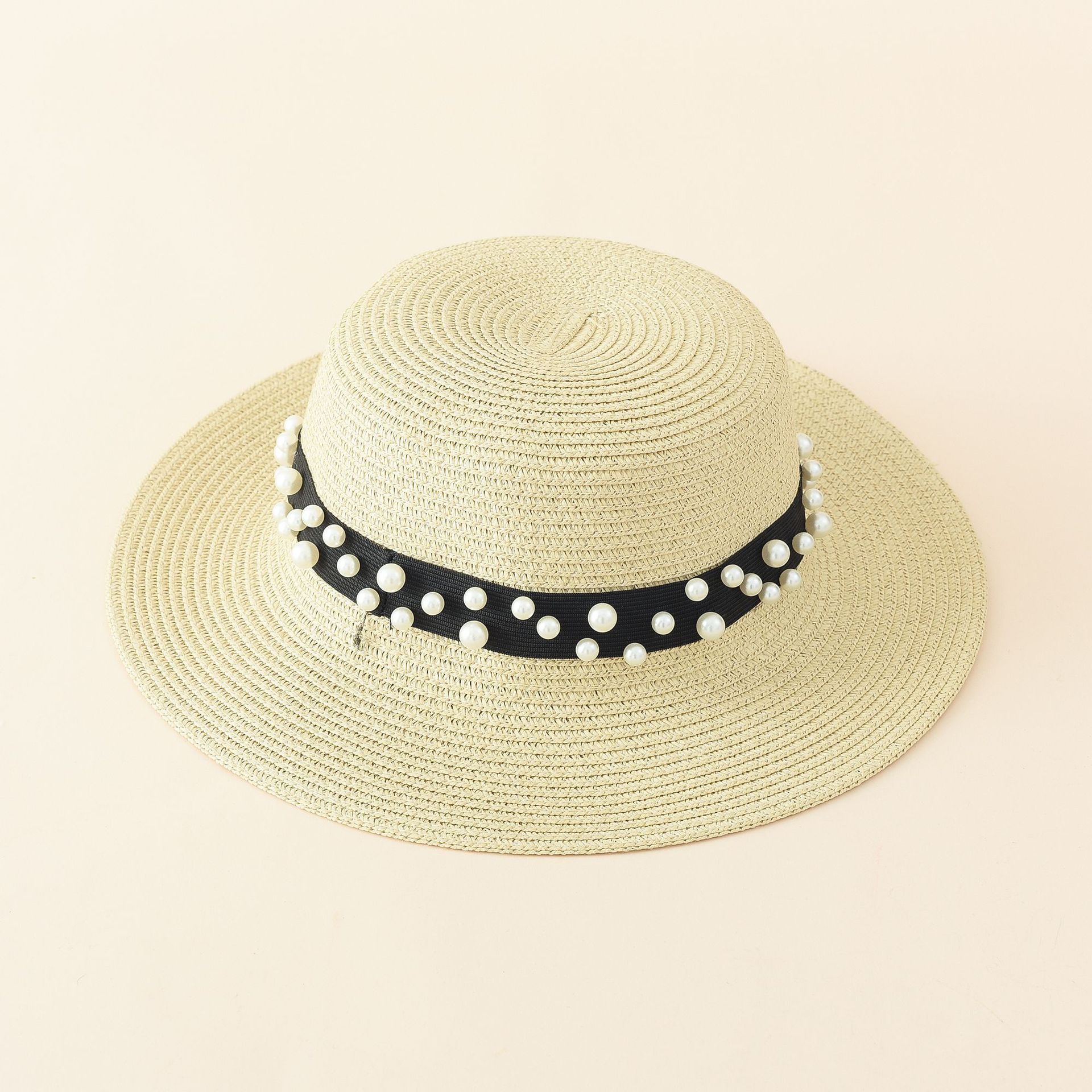 2021 Luz de lujo estilo paja tejida color sólido moda verano plano superior perla decorativa borde corto sombrero de paja a prueba de sol