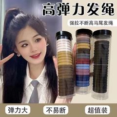 タオルの輪の皮カバーの女性の紐はポニーテールの髪輪を刺します。