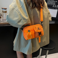 休闲轻便日系胸包撞色潮牌运动多兜女包简约抽绳多功能单肩斜挎包