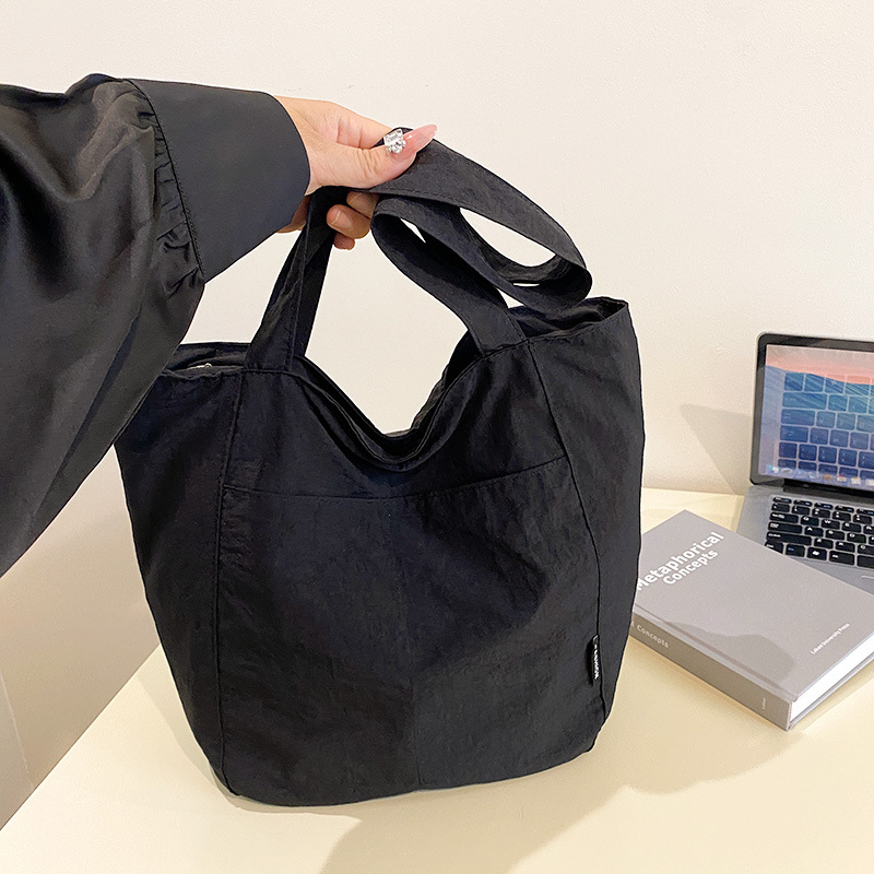 Casual japonés nylon impermeable ocio color sólido simple de gran capacidad para estudiantes de clase de viaje de hombro mochila