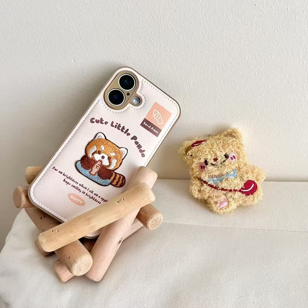 Cachorro bordado de dibujos animados para iPhone15/16 chaqueta de plumón funda para teléfono móvil Apple 14promax otoño e invierno 13p mujer