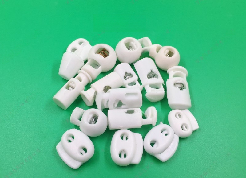 Single hole double hole black and white plastic spring buckle elastic buckle rope buckle pig nose buckle