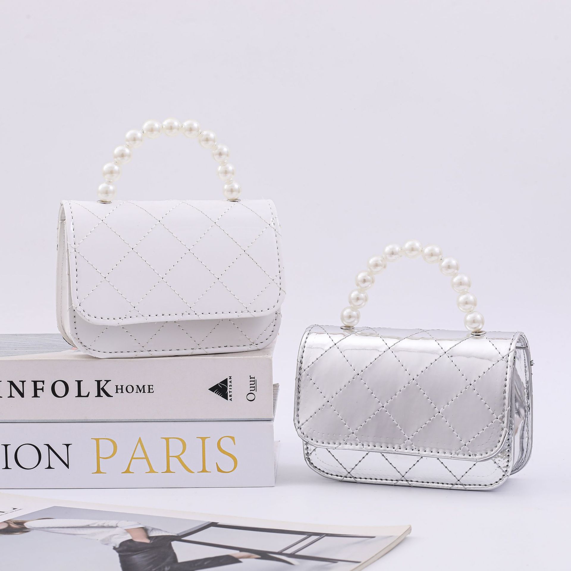 Nuevo cross-border Lingerie PU bolso de perla hermoso bolso de princesa universal bolso de moda bolso de cambio al por mayor