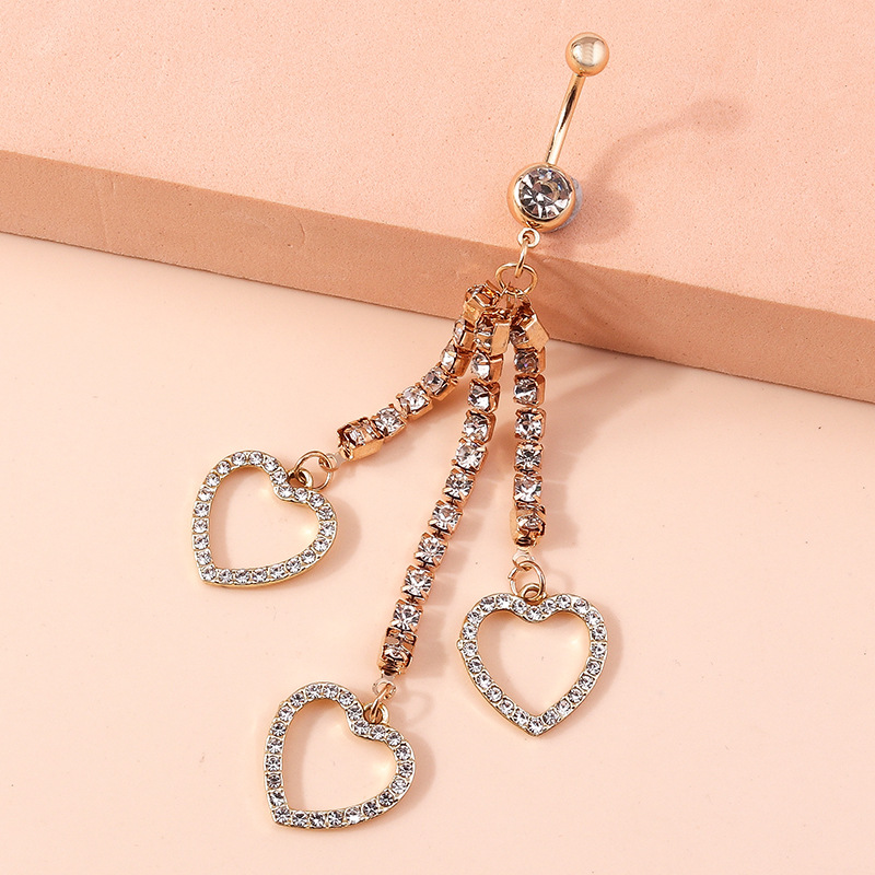 Piercing de nombril cœur avec chaîne en diamant et griffe_voghion.com