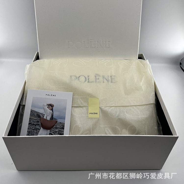 Nueva caja de regalo de nicho, bolsa de silla de montar, bolsa de compras, bolsa de bola de masa, bolsa de cara sonriente, bolsa de guisantes, bolsa de concubina real, papel de copia, juego completo