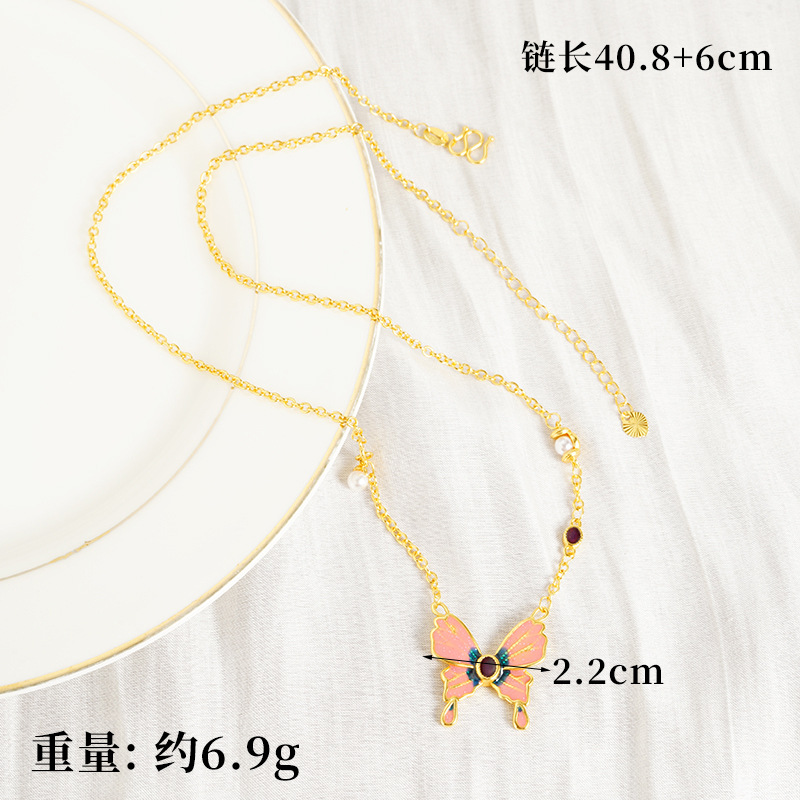 Vietnam Shajinshan Wild Tea Butterfly Collar Moda femenina Advanced Sense Ventana vacía Esmalte Butterfly Juego exquisito de tres piezas con accesorios