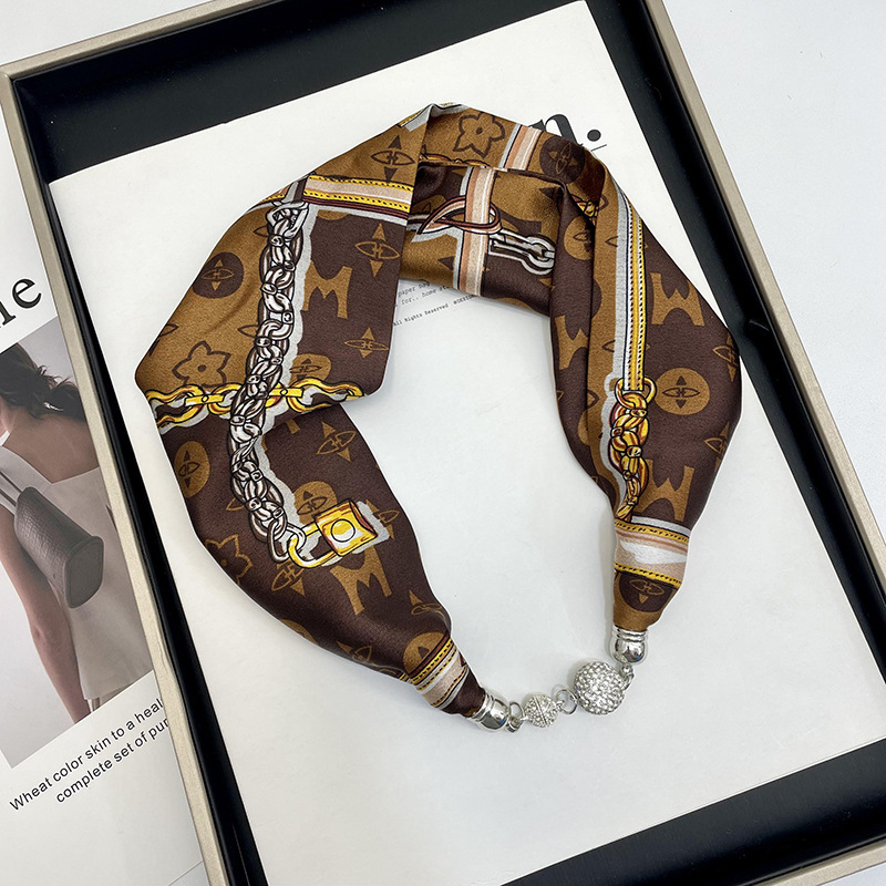 Primavera y verano nueva celebridad en línea mismo estilo banda de pelo bufanda correa de muñeca perezoso multi-funcional hebilla de succión magnética pequeña bufanda Venta caliente