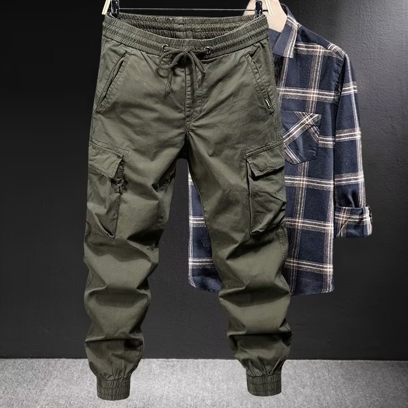 Ejército verde overoles hombres primavera y otoño marca de moda suelta tobillo-atado montañismo al aire libre pantalones tácticos hombres pantalones casuales americanos