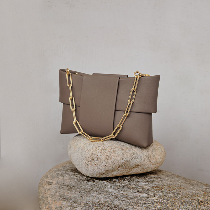 The Bow Series of Bags for Women, Niche Design Chain Bag, Fashionable and Simple Hand-Held Leather Crossbody Bag The Bow Series of Bags for Women, Niche Design Chain Bag, Fashionable and Simple Hand-Held Leather Crossbody Bag