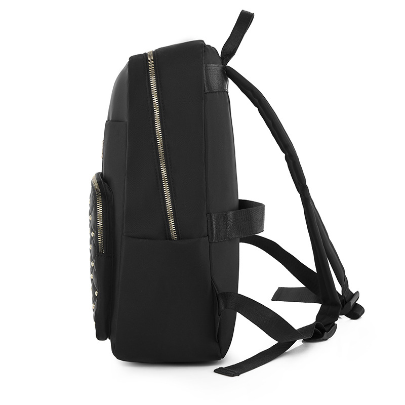 2023 nueva mochila de tela Oxford para mujer casual moda rombo remache mochila ligera mochila de viaje urbano