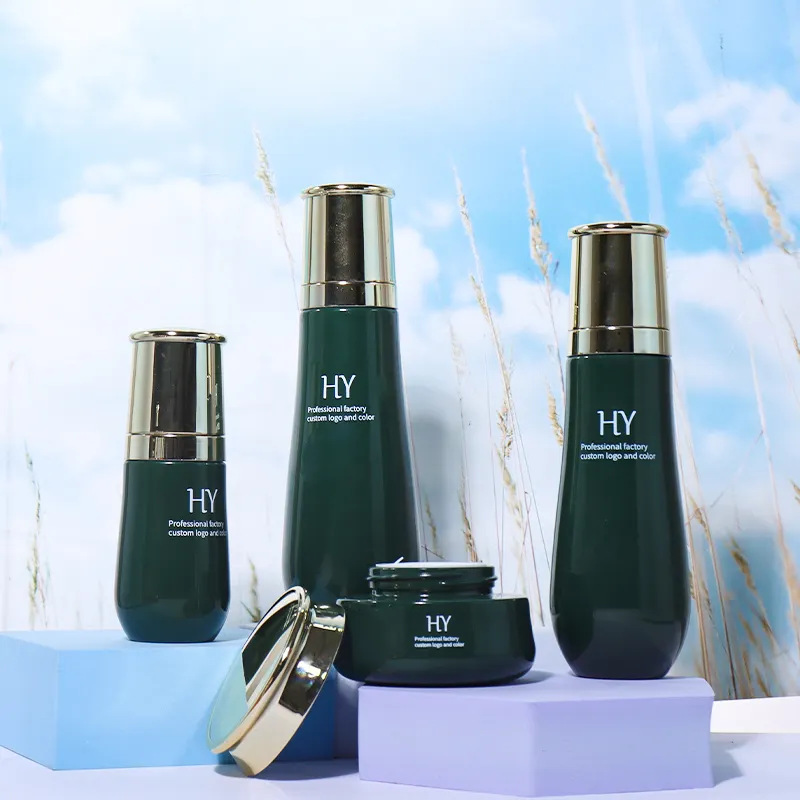 厂家直销椭圆形玻璃瓶美容化妆品整套乳液和绿色玻璃瓶和50克霜罐