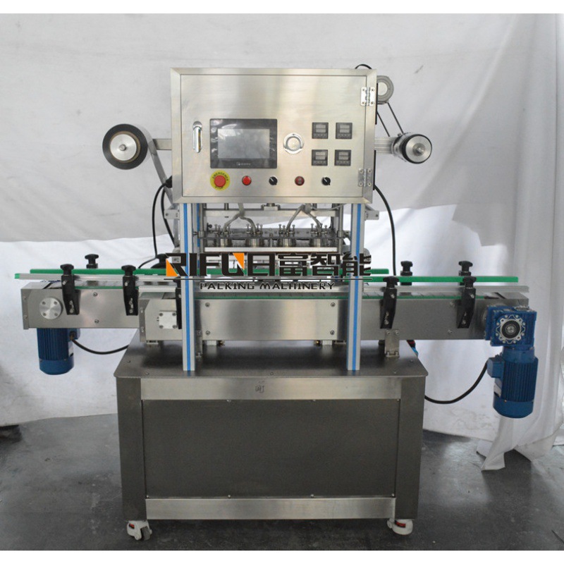 湿纸巾桶塑杯封口机  圆瓶卷膜封口生产线  一出四铝膜封口设备