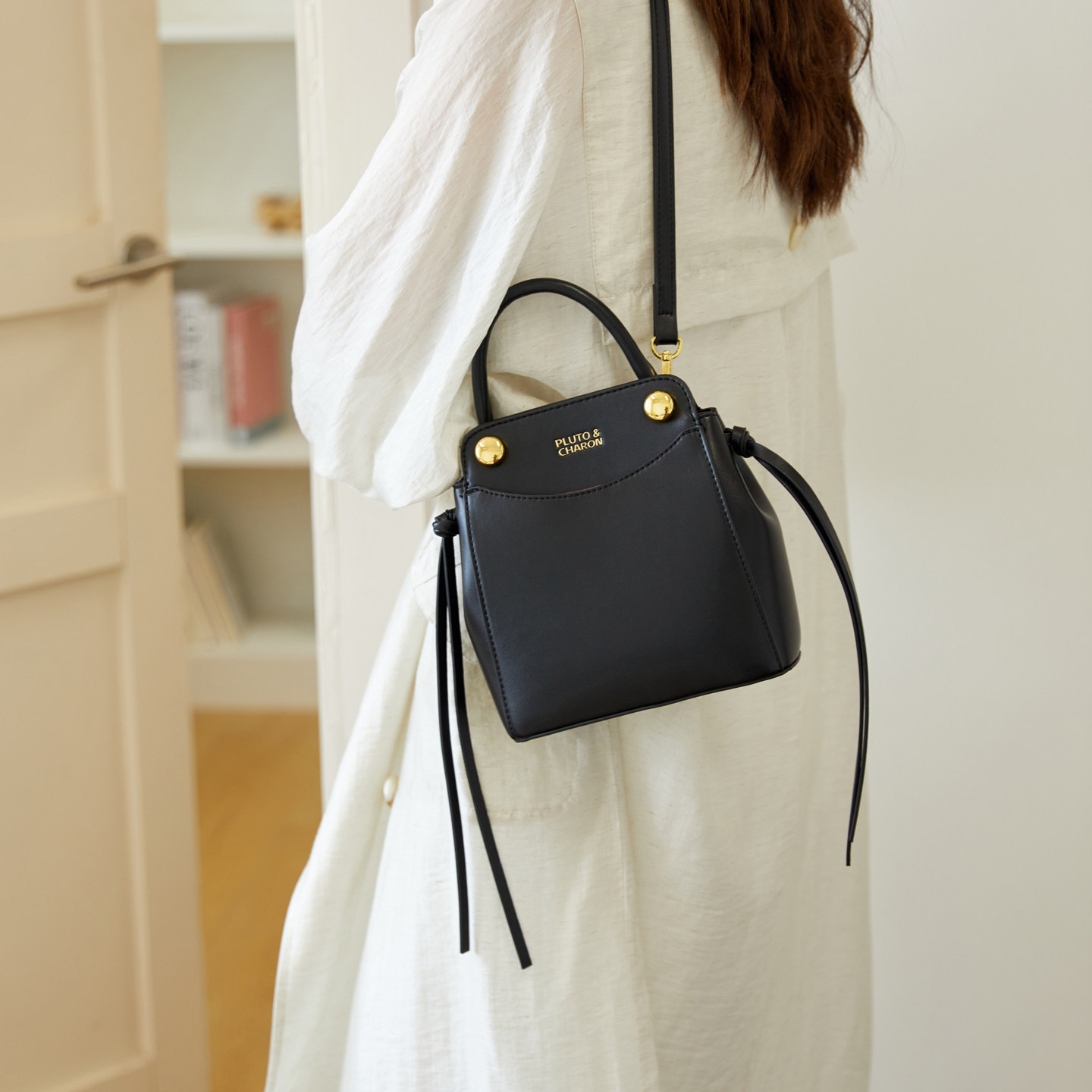 Bolso de moda popular 2026 simple mochila de verano nueva mujer simple este año sensación universal cubo hombro