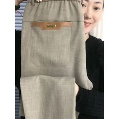 男性の天糸麻茶金色夏の新型通気性の薄い男性カジュアルパンツのストレートタイプはシンプルで上品です。