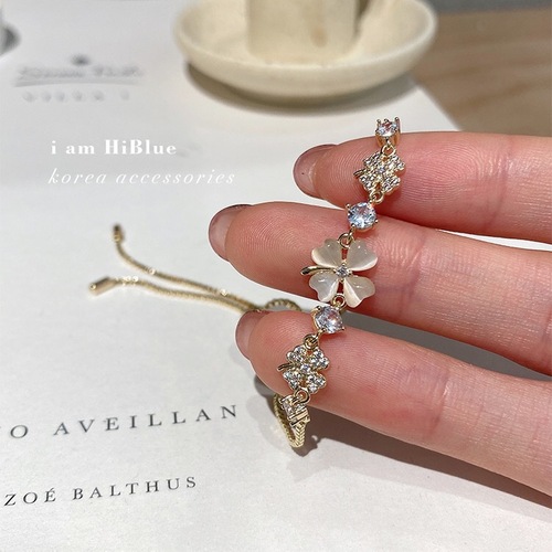 Korean style four-leaf clover micro-encrusted zircon bracelet with adjustable drawstring design cat’s eye clover jewelry