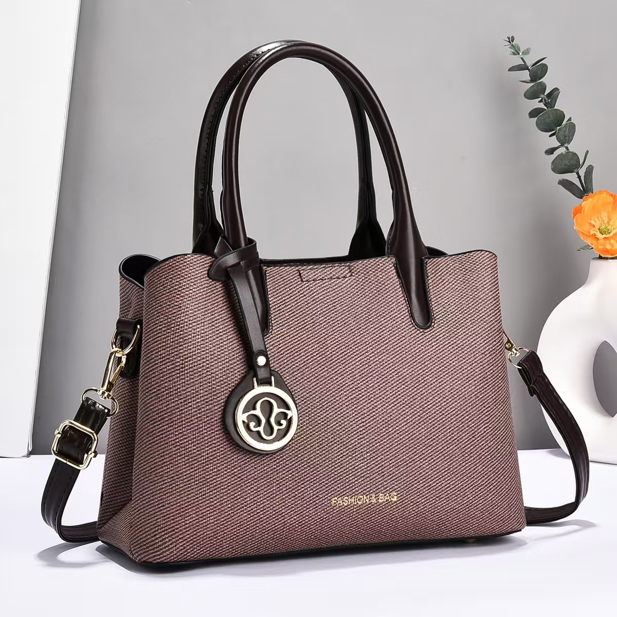Bolso de mano universal nuevo bolso de hombro de moda bolso de mediana edad bolso de madre bolso de transporte casual bolso de mano