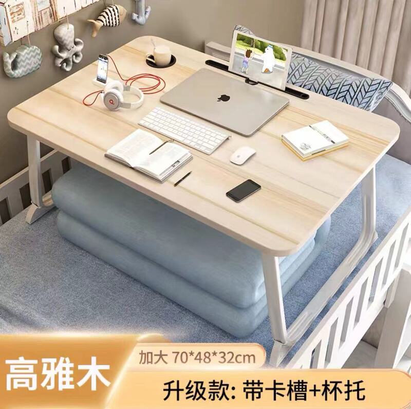 携帯用ベッドの上の小さなテーブルが窓をはねて折りたたみます。|undefined