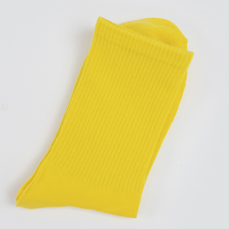 Calcetines de mujer para primavera y otoño, calcetines de algodón de color liso, versátiles y a la moda, calcetines holgados, calcetines de longitud media, calcetines deportivos que absorben el sudor, venta al por mayor.