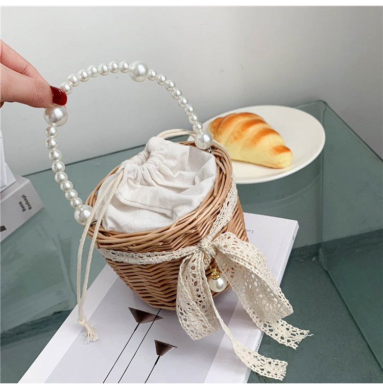 Fashion Round Straw Pearl Portable Bag display picture 16