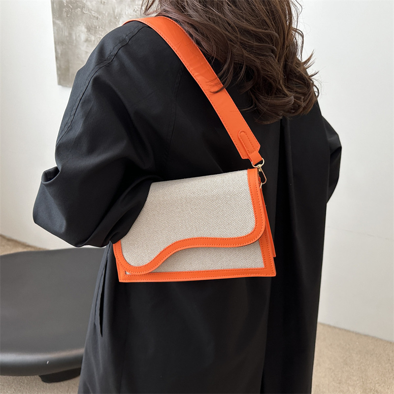 Bolsos populares de este año para mujer 2024 nuevo bolso de mensajero de un solo hombro con costuras de color en contraste de moda bolso cuadrado pequeño portátil