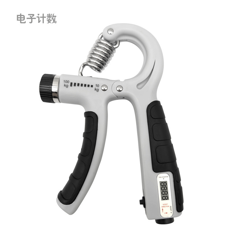 握力器は腕の男性の専門力のフィットネスの器材を練習します。|undefined