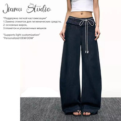JIAMUアメリカ式の曲がり角の元の牛のbaggy jeansの中性のゆったりしている広足のジーパンの男女の郭の形のバナナのズボン