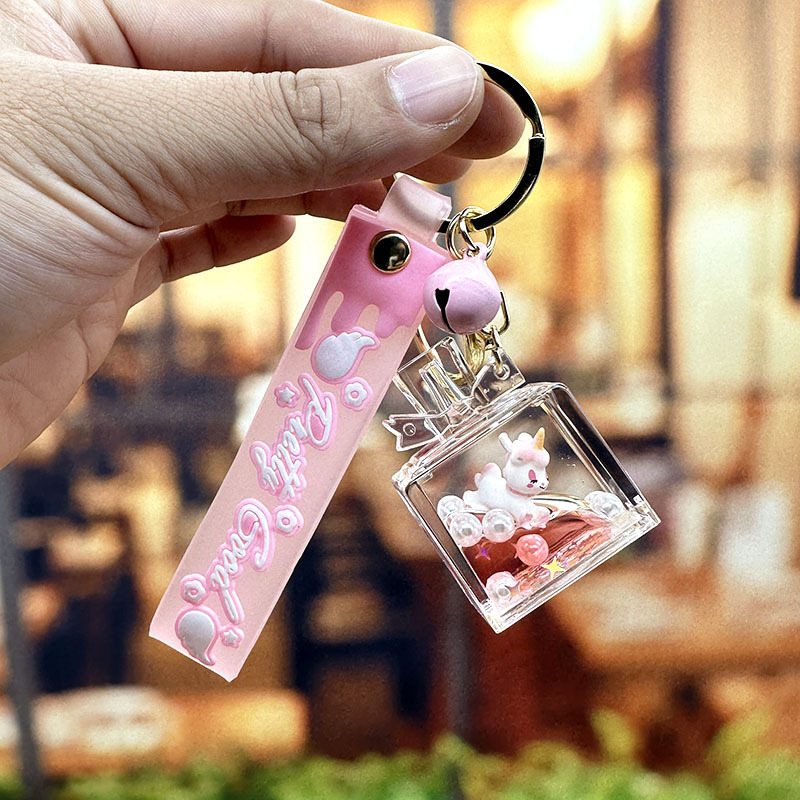 Púrpura estrella de cinco puntas líquido Quicksand llavero chica corazón flor de cerezo aceite colgante lindo tridimensional mochila adornos para mujeres