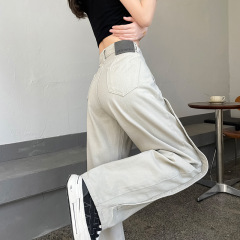 アメリカ式の曲がり角の大きい足のジーパンの女性2025春夏の新型の高い腰はゆったりしていてやせている潮流のまっすぐな筒は地面のズボンを引きずります