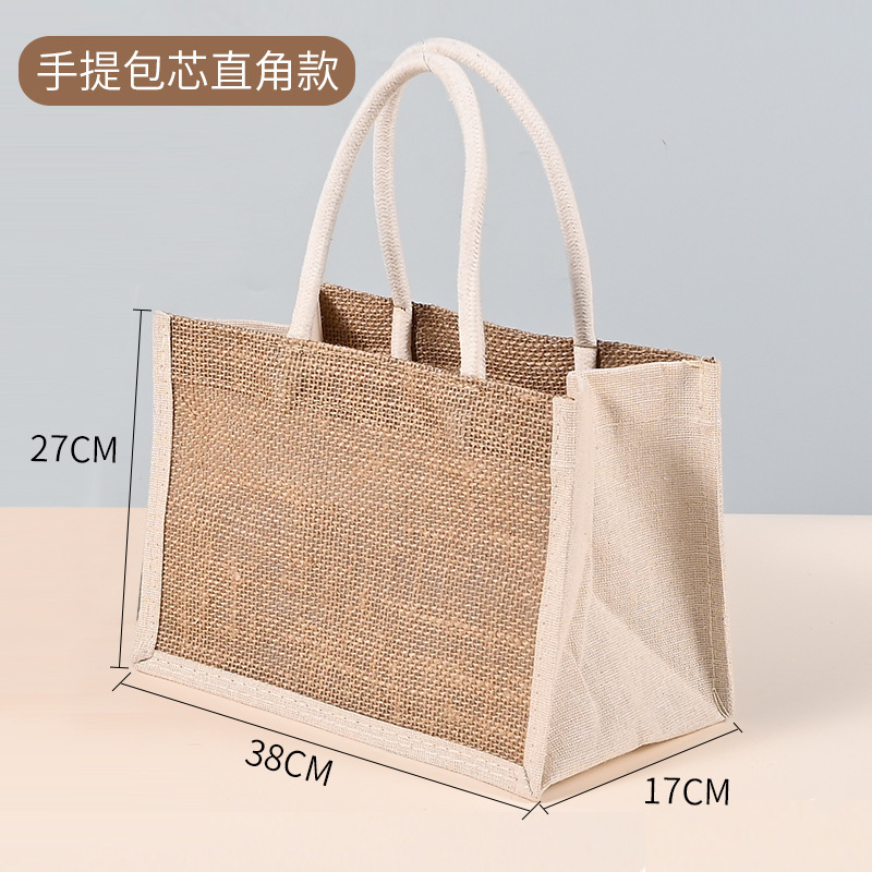 現物の麻の袋と同じ黄麻のショッピングバッグのプレゼントのレトロな亜麻の手提げ袋の空白の手描きの麻の布のカバンは注文します。|undefined