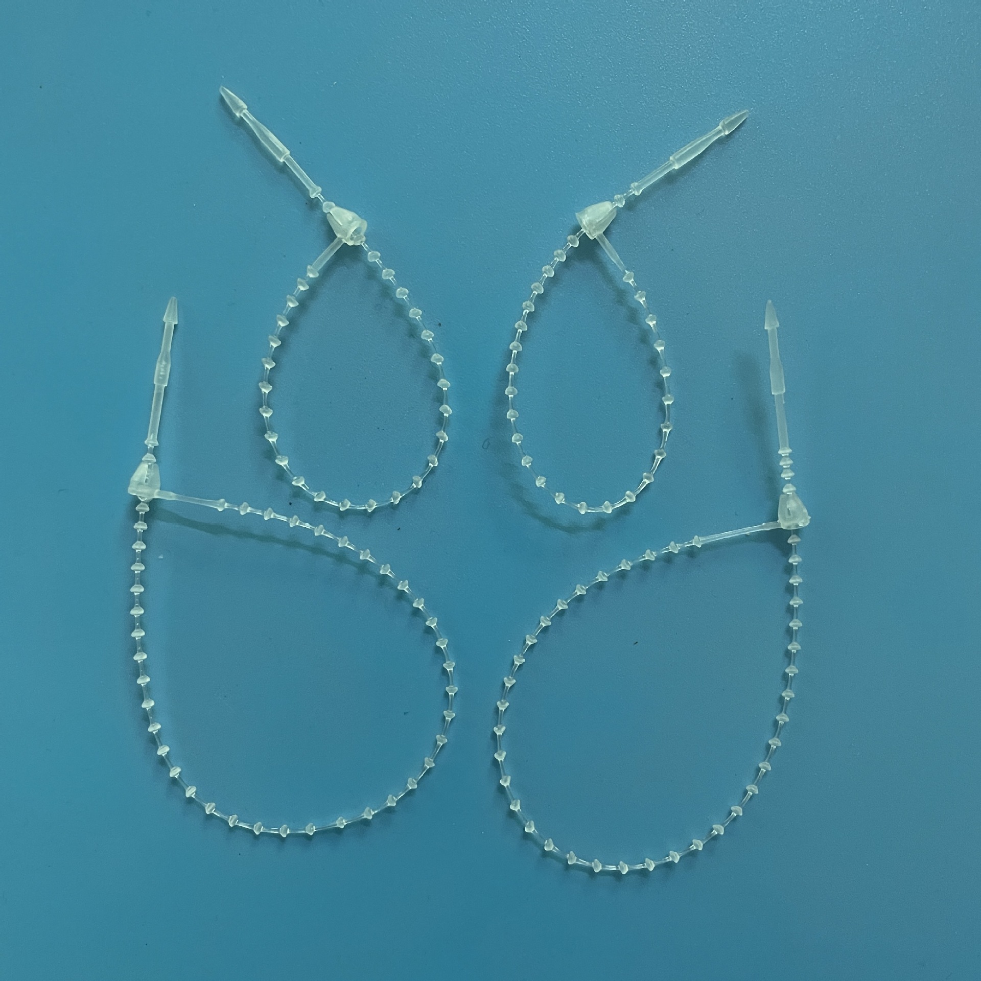 产销质优价廉透明珠型子母扣 珠帘吊绳 PP尼龙珠带 吊牌胶针