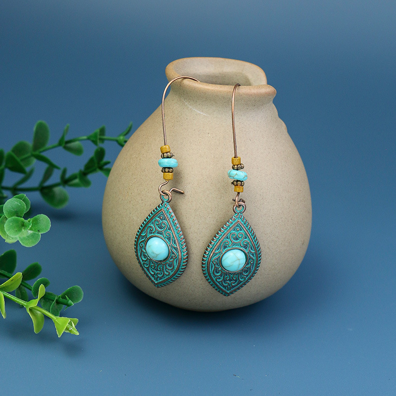 Wholesale Jewelry 1 Pair Bohemian Leaf Round Sun Alloy Turquoise Drop Earrings display picture 1