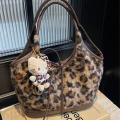 韓国版レトロぬいぐるみヒョウ柄トートバッグ新型大容量蝶結び通勤ハンドバッグ通勤脇下カバン